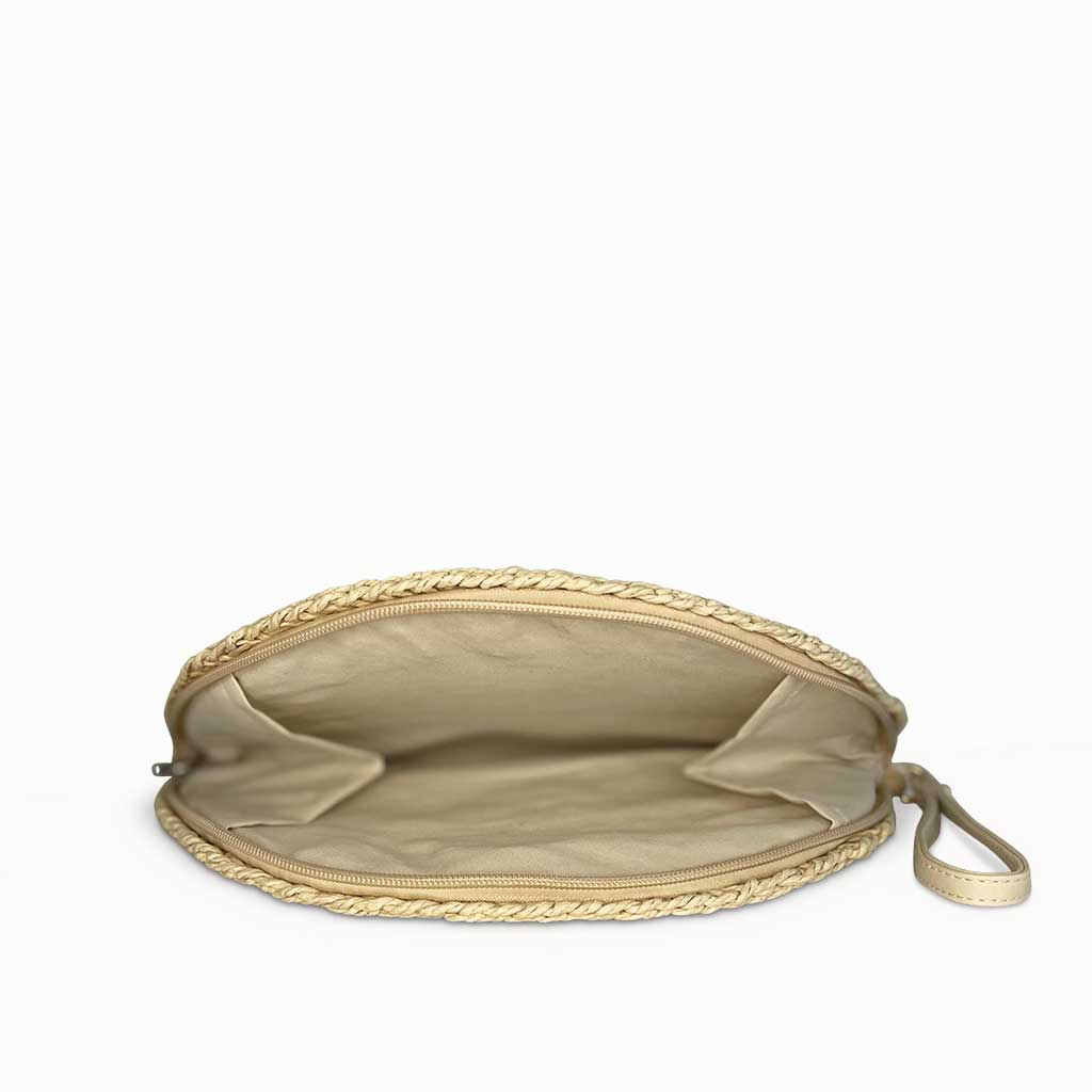 The Gaia Half Moon Straw Clutch Bag in light beige